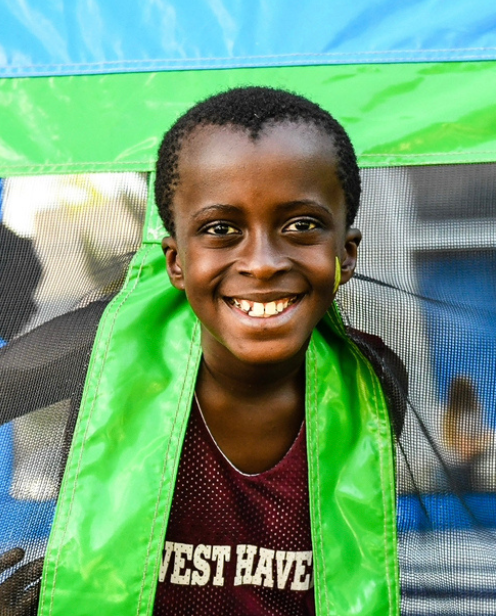 Refugee boy at the Utah Refugee Connection World Refugee Day